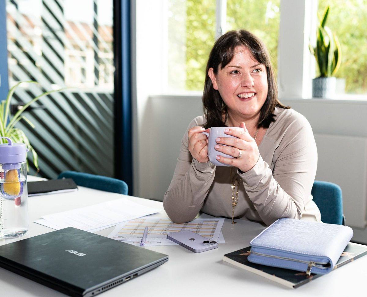 Liz Rowlands at her desk